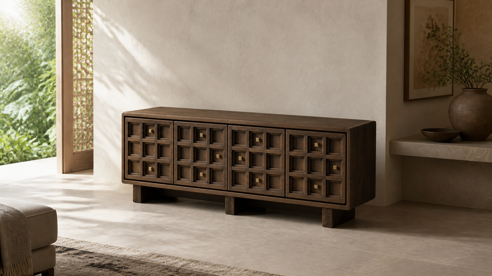 AUTHË v2 panoramic header — Tactile Grid Credenza in a light contemporary interior, showing four doors and thirty-six hand-carved ash relief modules with a personal bronze datum constellation