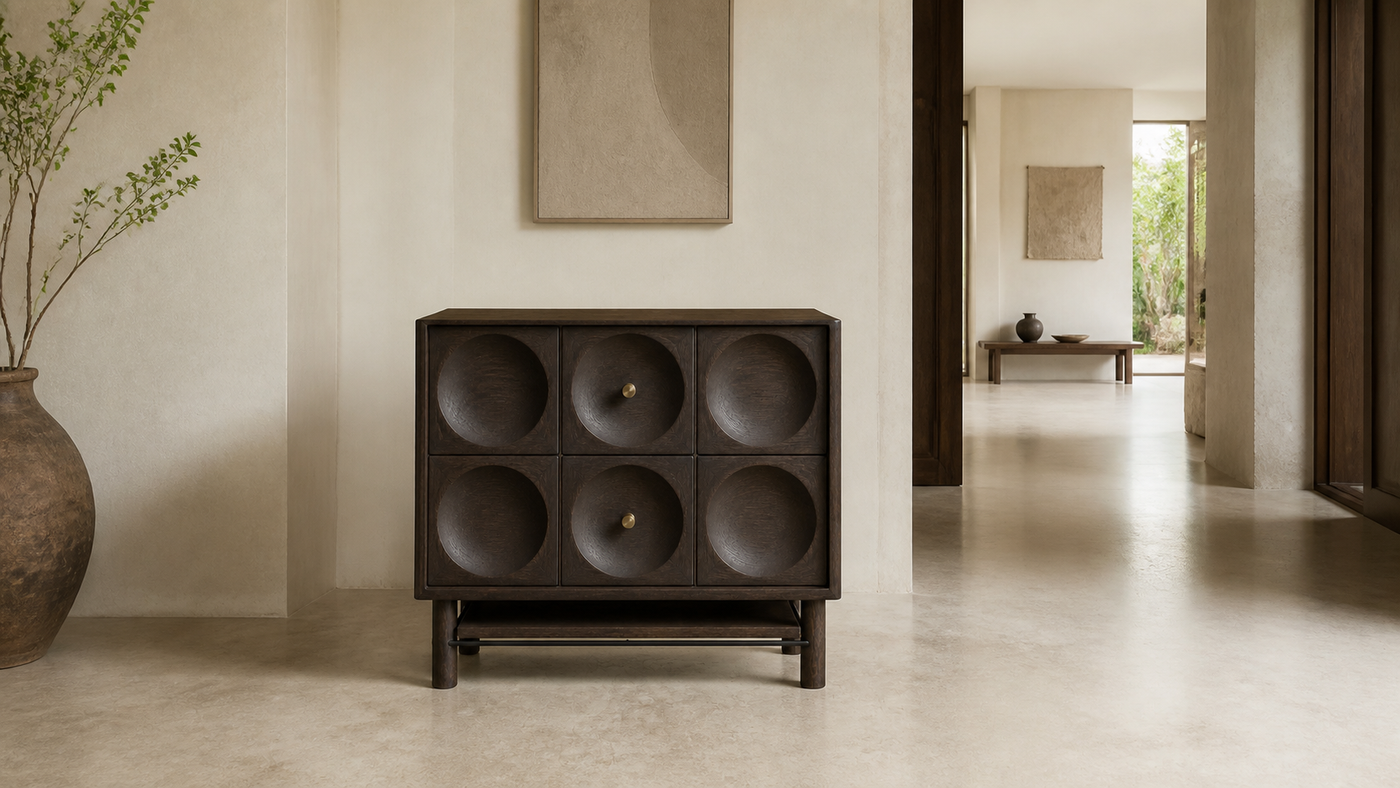 AUTHË v2 panoramic header — Orbit Bedside in a light contemporary interior, showing six concave ash reliefs, two centre bronze pulls and one open lower shelf