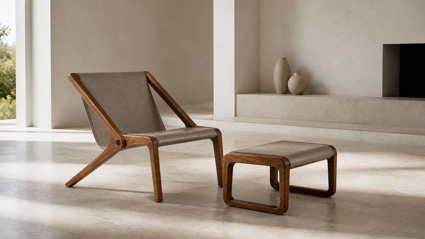 AUTHË v2 panoramic header — Fold Lounge and ottoman in a light limestone room, with open walnut chair rails and closed-loop ottoman frames